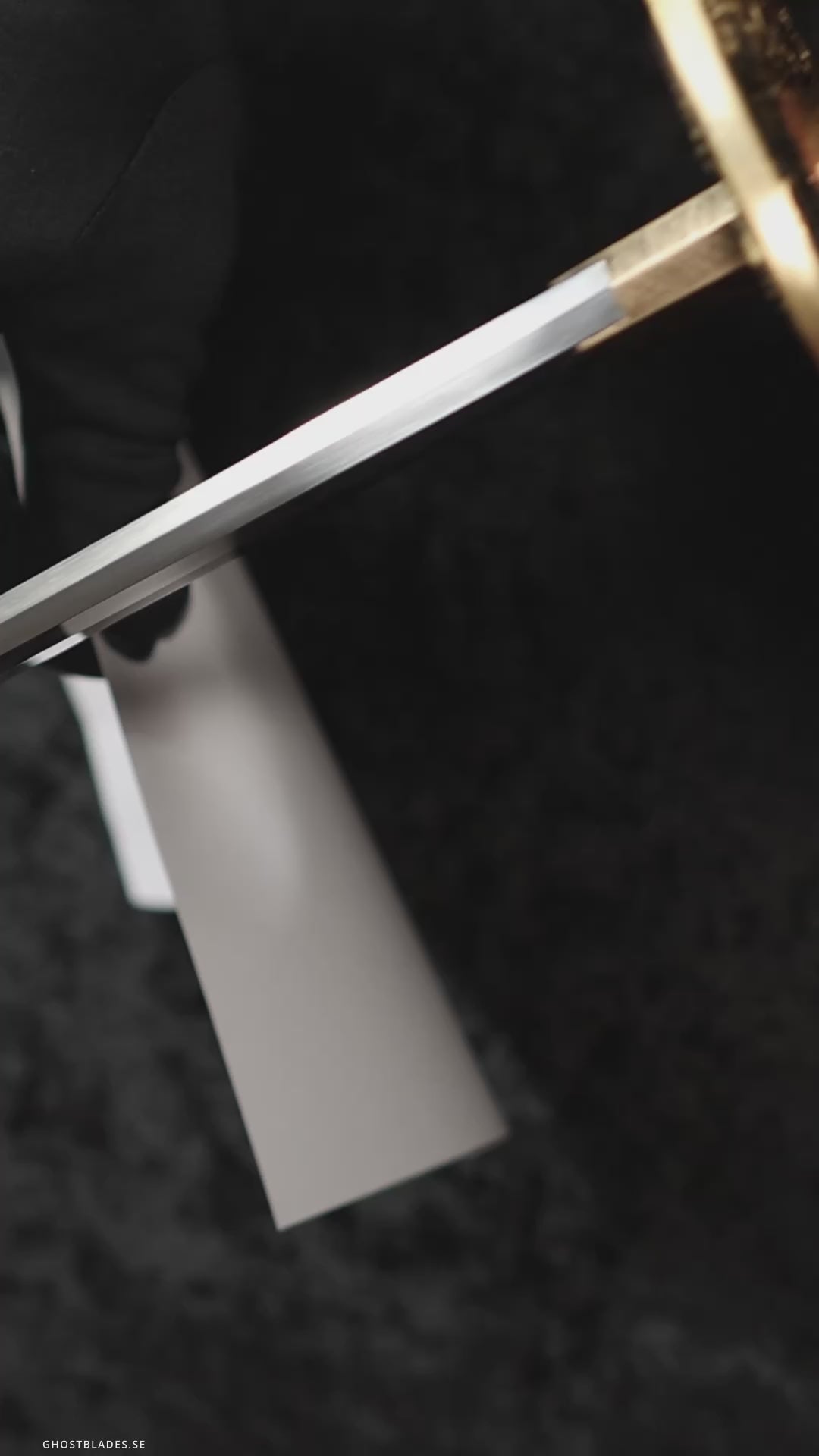 Cinematic showcase of the Vortex Katana by Ghost Blades - handmade samurai sword in T10 steel with genuine hamon, black-blue saya and gold fittings inspired by motion, balance and storm energy.