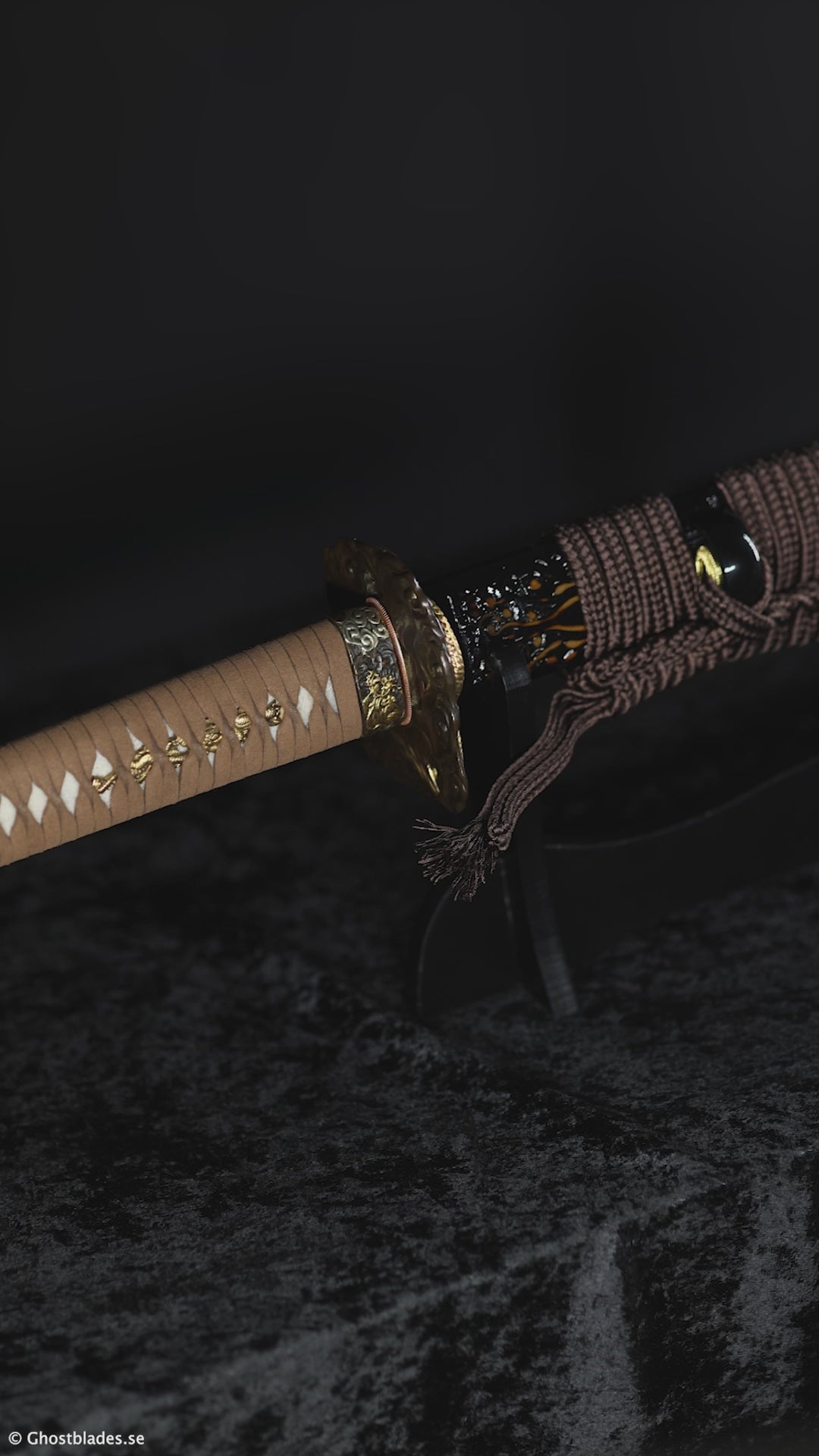 Cinematic showcase of the Black Octopus Katana by Ghost Blades - handmade samurai sword in T10 steel with real hamon, deep-black saya and bronze octopus fittings symbolizing power and mystery.