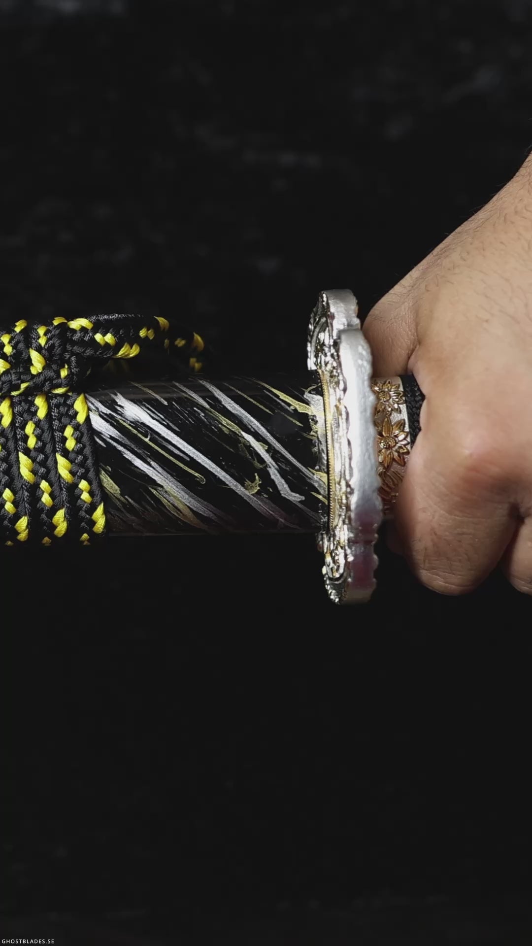 Showcase video of the Black Chapel Katana, a handcrafted T10 steel samurai sword with visible hamon, black lacquered saya and ornate cross-themed fittings.