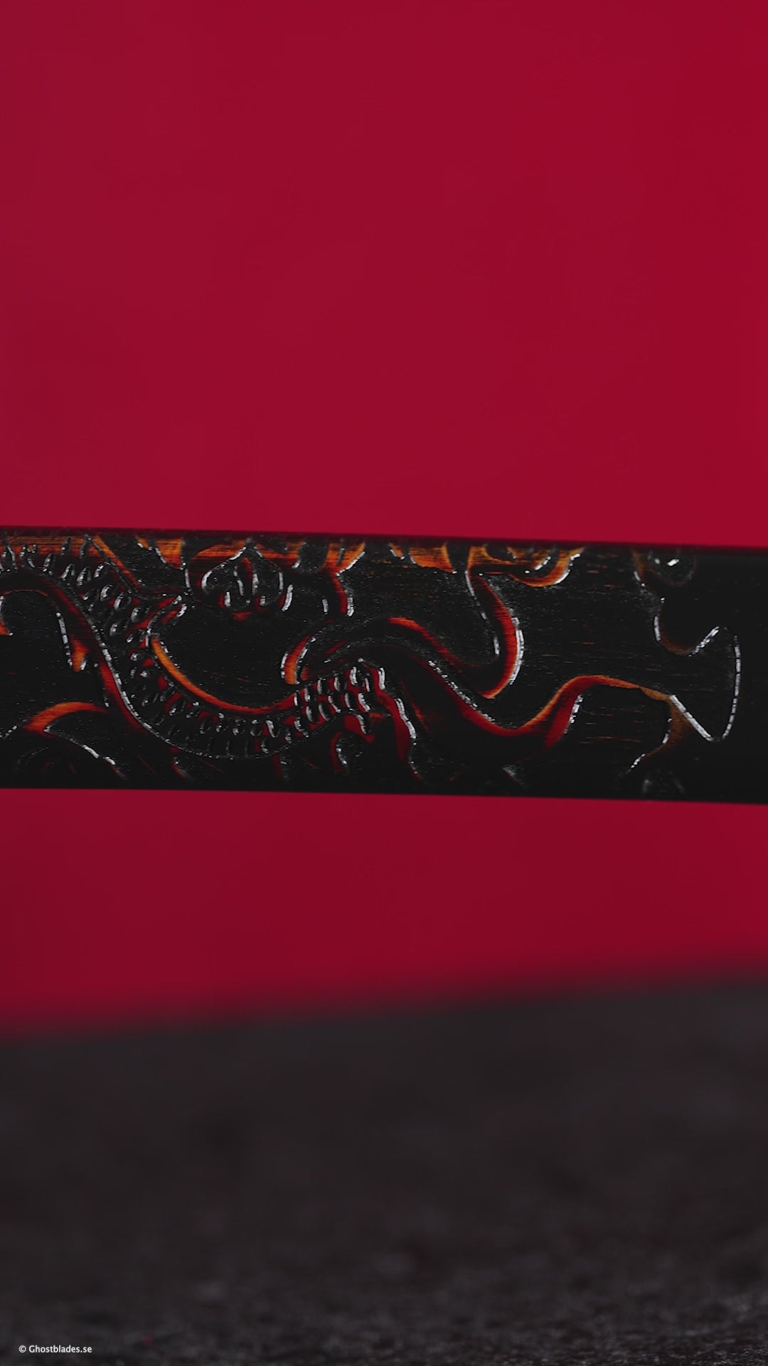 Cinematic showcase of the Dragon Flames Katana by Ghost Blades - handmade samurai sword in T10 steel with genuine hamon, red-gold saya and dragon-themed fittings symbolizing strength and rebirth.