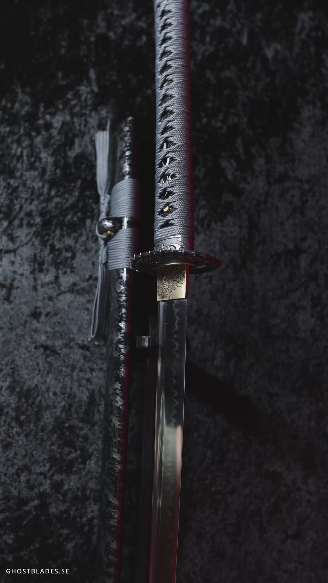Cinematic showcase of the Grey Requiem Katana by Ghost Blades - handmade samurai sword in T10 steel with genuine hamon, silver-grey saya and dark metal fittings symbolizing silence, strength and reflection.